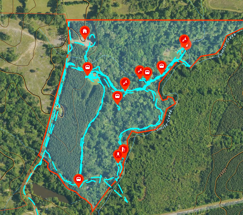 Aerial map of a tract in onX Hunt with parcel boundary, trail network, stand locations, and food plots labeled